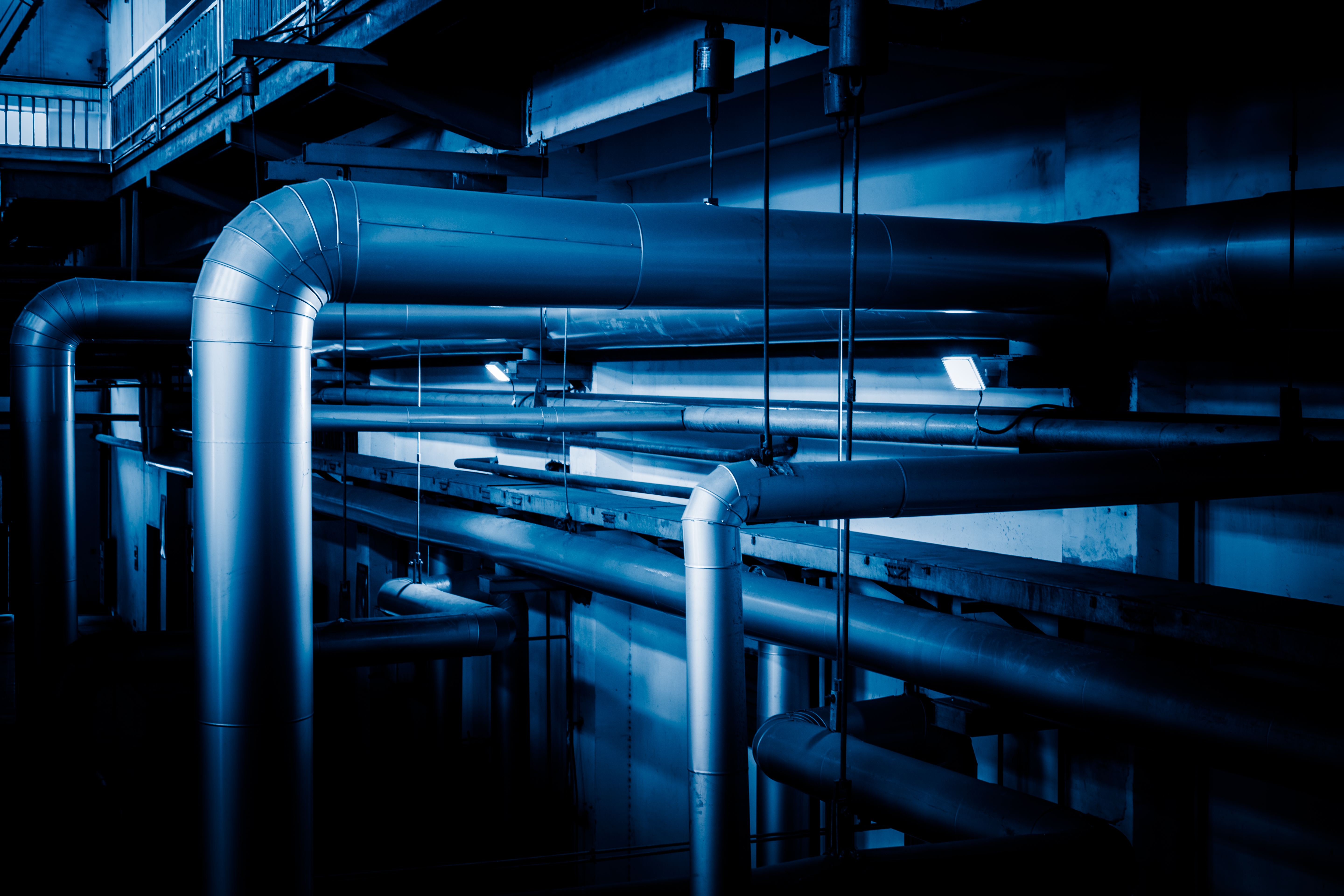 steel pipelines and cables in a plant,Industrial zone.